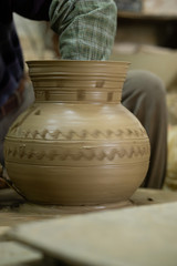 Fototapeta na wymiar Potter creating Silla traditional pottery - ceramics in Gyeongju South Korea