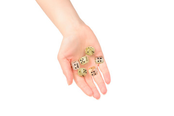 Woman throws dices isolated on white.