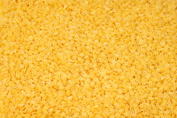 Raw pasta as a background. Pattern.