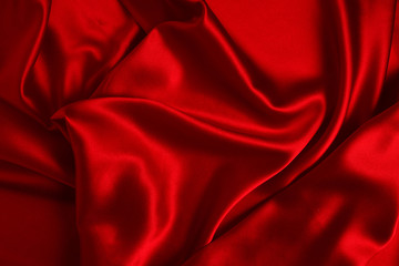 Fototapeta na wymiar Red silk or satin luxury fabric texture can use as abstract background. Top view.