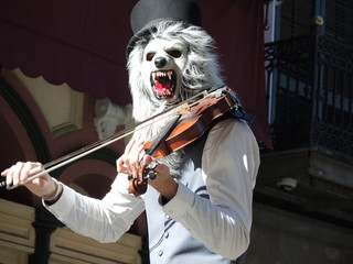 Musician with mask playing violin