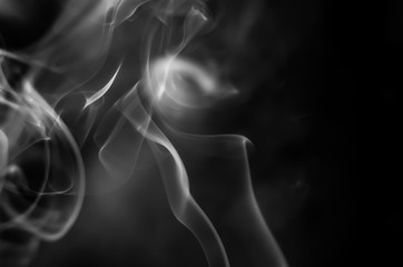 White smoke on a black background. Abstract elegant monochrome background.