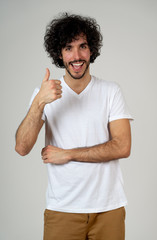 Portrait of young handsome cheerful man with smiling happy face. Human expressions and emotions