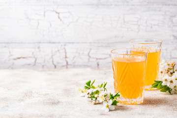 Glasses with fresh apple juice or cider
