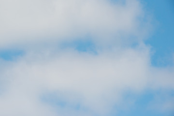 Beautiful white puffy clouds with pretty blue sky - nature background