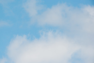 Beautiful white puffy clouds with pretty blue sky - nature background