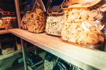 Matera, Italy - March 11, 2019: Traditional products of Italian gastronomy for sale as souvenirs for tourists.