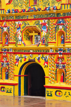 Colorful facade of Church of San Andres Xecul, Guatemala