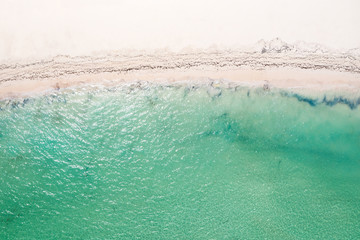 Fototapeta na wymiar Aerial view with tropical beach of caribbean sea with waves