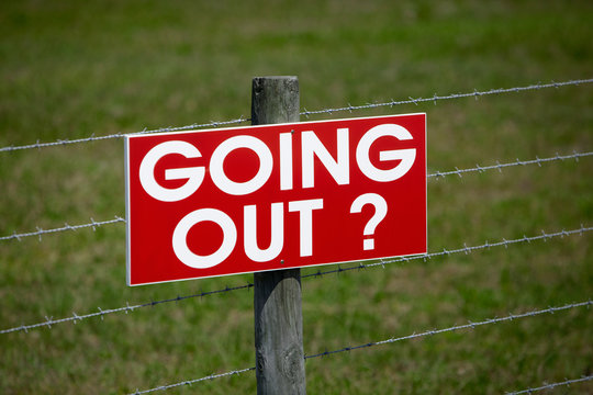 Sign on a Barbwire Fence