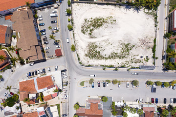 Aerial view from drone on street with houses and roads