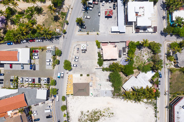 Aerial view from drone on street with houses and roads