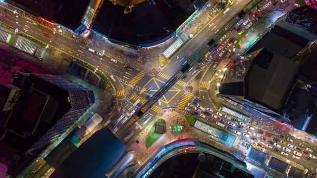 night time illuminated kuala lumpur city center famous traffic street crossroad aerial topdown panorama 4k timelapse malaysia