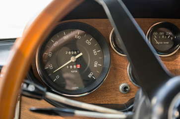 Close up of speedometer in retro Ferrari dashboard