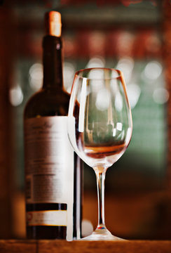 Close up of bottle of wine and glass