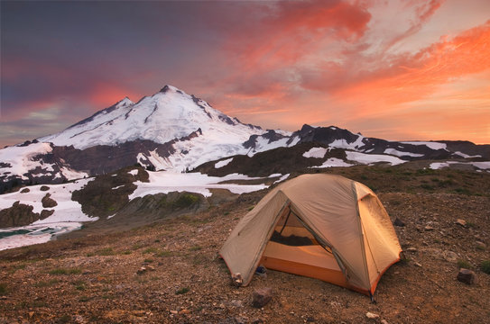 View of tent at campsite in snowy mountain landscape