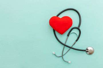 Simply minimal design with medicine equipment stethoscope or phonendoscope and red heart isolated...