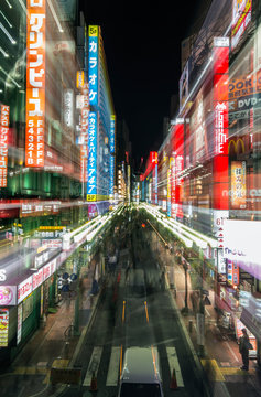 Tokyo city street lit up at night, Tokyo, Japan