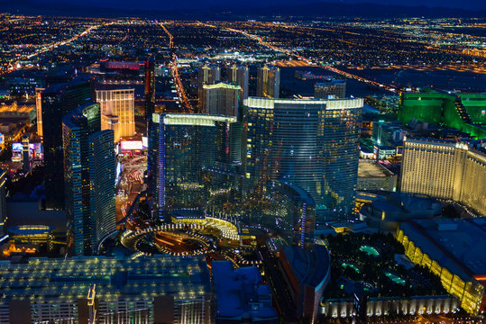Aerial view of Las Vegas cityscape lit up at night, Las Vegas, Nevada, United States