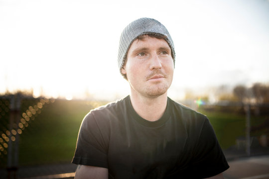 Caucasian man wearing beanie hat outdoors
