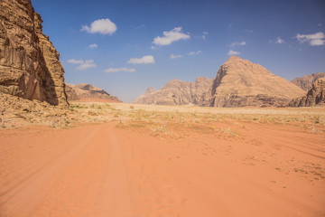 Fototapeta na wymiar Wadi Rum desert scenery landscape valley and mountain in sand dunes environment, sightseeing tour Middle East famous heritage place for tourists 