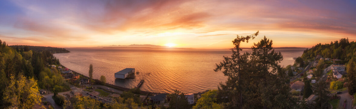 Panoramic view of sunset over lake in remote landscape