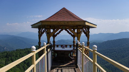 garden house with mountains in the background