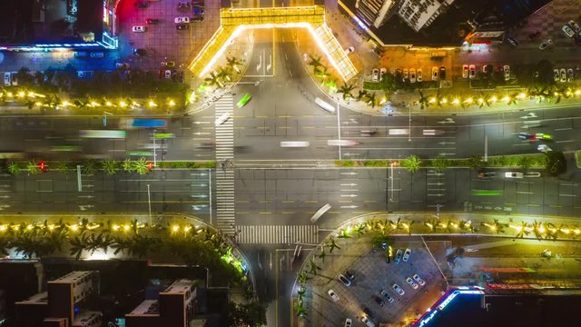 night time illuminated zhuhai macau traffic street crossroad aerial topdown panorama 4k timelapse china 