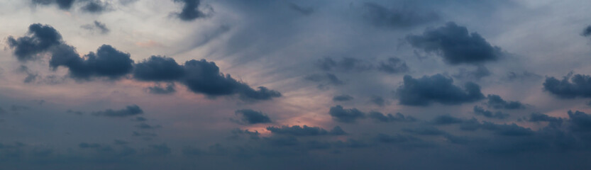 Fototapeta na wymiar Dramatic cloudscape during a dark and colorful sunset.