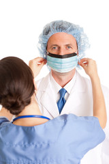 Nurse Preparing Surgeon Doctor in Mask and Hair Net - Medical Healthcare