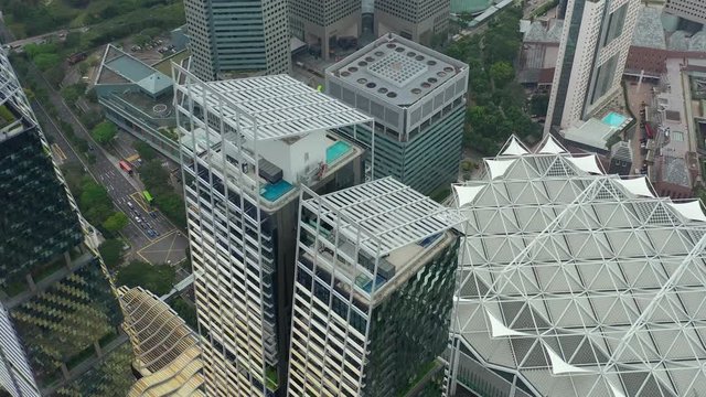 day time singapore city center famous buildings rooftop aerial panorama 4k 