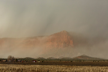 Red mountain with snow haze near Page