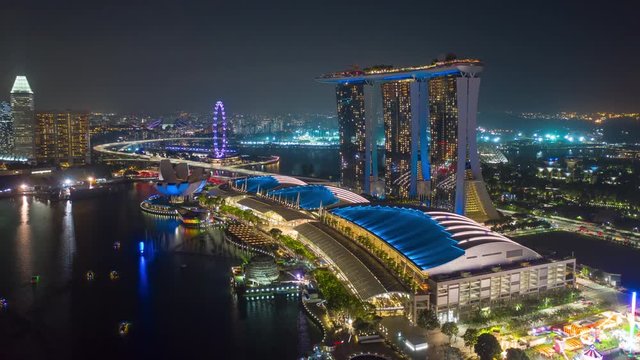 night illumination singapore city famous marina hotel mall bay aerial panorama 4k timelapse