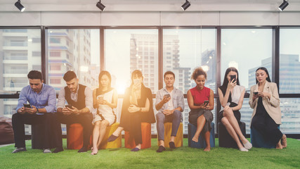 collage concepts of different happy people in casual style and different age holding cellphone, checking and using messenger