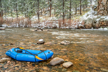 inflatable packraft on a mountain river