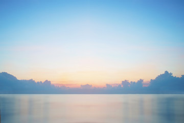 Sunrise horizon cool sea background on horizon tropical sandy beach; relaxing outdoors vacation	 - 265572142