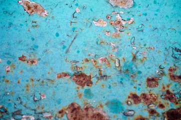 old rusty metal with blue cracked paint