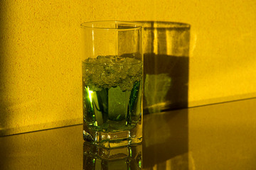 a glass of tarragon in the sunlight