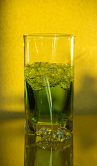 a glass of tarragon in the sunlight