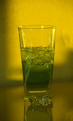 a glass of tarragon in the sunlight