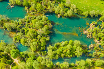 Naklejka na ściany i meble Croatian nature, beautiful waterfalls on Mreznica river from air, panoramic view in spring, popular tourist destination, overhead shot