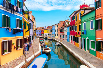 Fototapeta na wymiar Colourfully painted house facade on Burano island, province of Venice, Italy