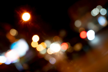 Bokeh light on the night street, tilted view.