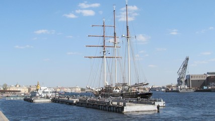 Fototapeta na wymiar the sailboat moored to the pier of St. Petersburg 