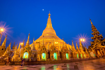 Beautiful night scene Shwedagon Paya pagoda Myanmer famous sacred place and tourist attraction landmark.Yangon, Myanmar
