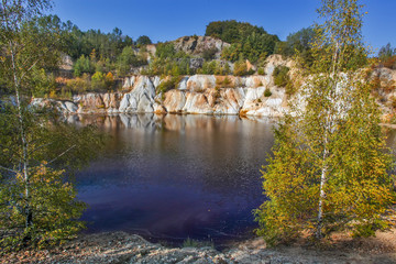 Black artificial lake and hills - mining and production of copper in Bor, Serbia