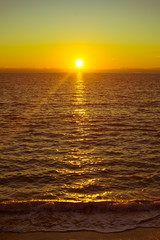 Sunset or sunrise over sea surface