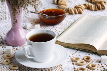 Tea and reading relaxation time still life	