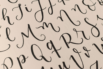 Alphabet background with beautiful caligraphy of hand made  letters 