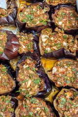 Fried eggplant covered a mix of vegetables